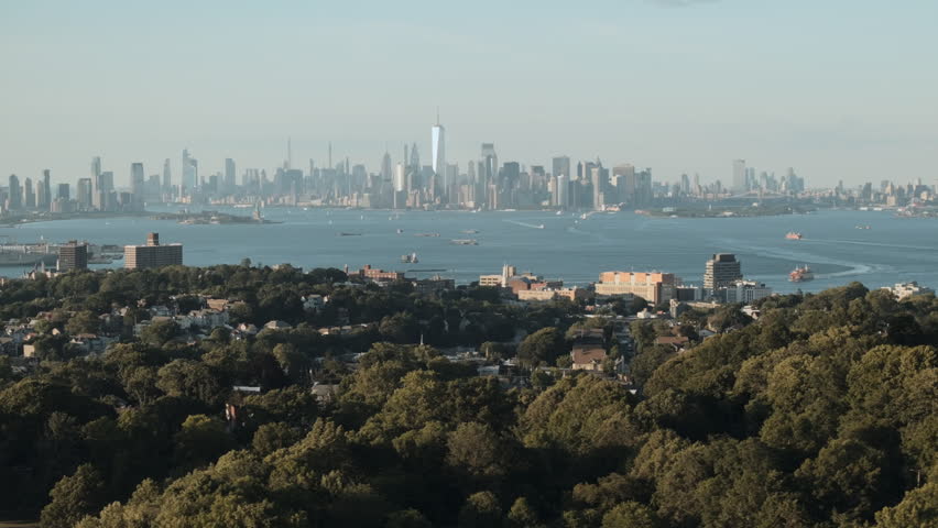 Establishing shot of Staten Island and Lower Manhattan. Shot on a summer day in New York City.