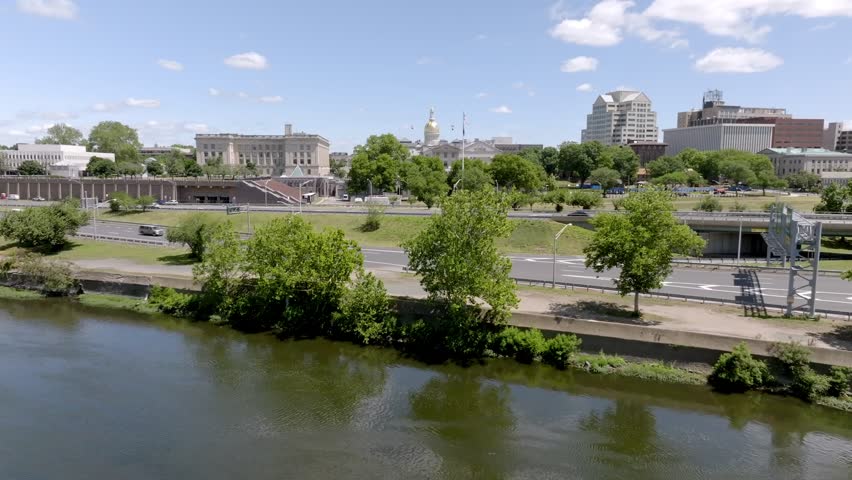New Jersey state capitol building in Trenton, New Jersey with drone video moving in low.