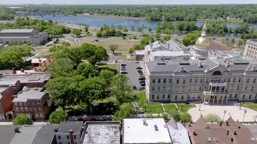 New Jersey state capitol building in Trenton, New Jersey with drone video moving left to right close.