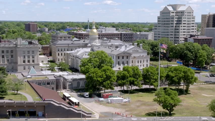 New Jersey state capitol building in Trenton, New Jersey with drone video moving in a circle parallax.