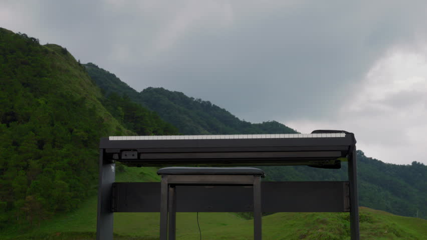 Low Angle Back View of Vintage Asian Male Musician Standing at Piano Mountain Peak