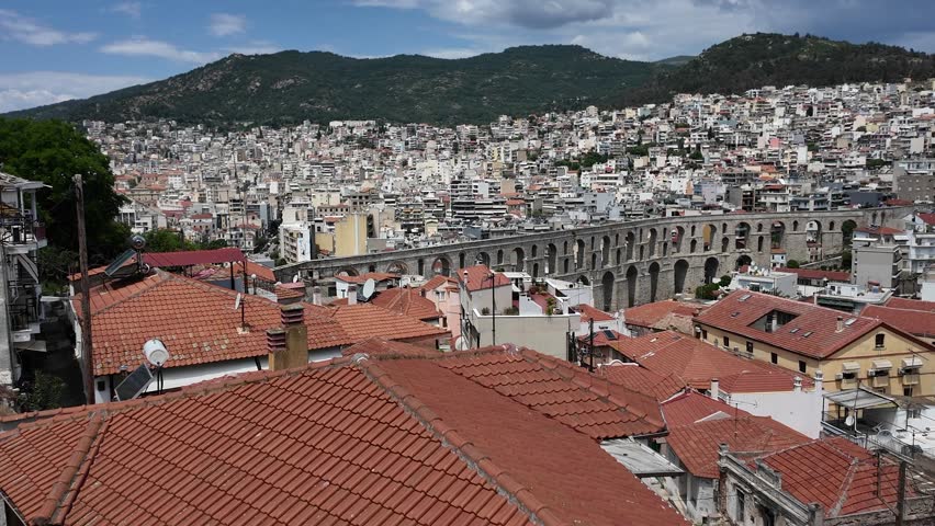 Kavala, Eastern Macedonia and Thrace, Greece - May 21st, 2026 - street footage of the historical town in Northern Greece, square, aqueduct, streets, hotels, Byzantine castle, parks, architecture, facades, embankment, Aegean sea coastline in late spring