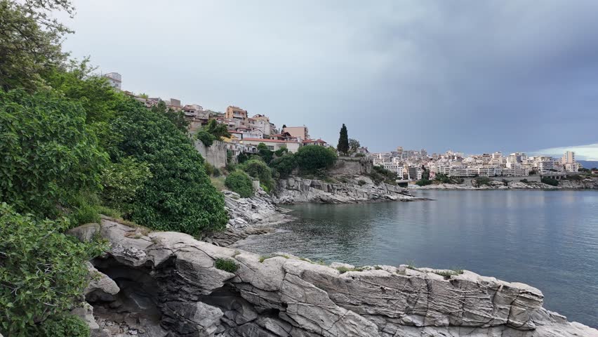 Kavala, Eastern Macedonia and Thrace, Greece - May 21st, 2026 - street footage of the historical town in Northern Greece, square, aqueduct, streets, hotels, greek orthodox church, Byzantine castle, parks, architecture, facades, embankment, Aegean sea coastline in late spring