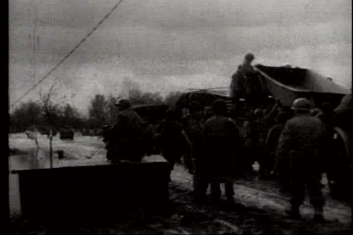 1940s - A film about World War II - footage of the U.S. military crossing a river