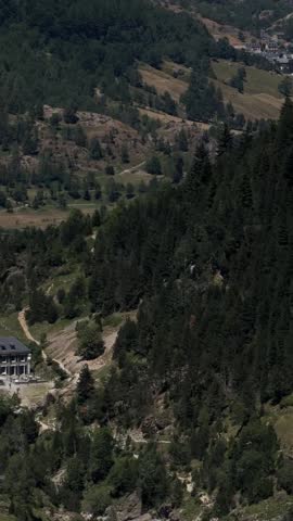 Vertical rocky valley with mountain trail