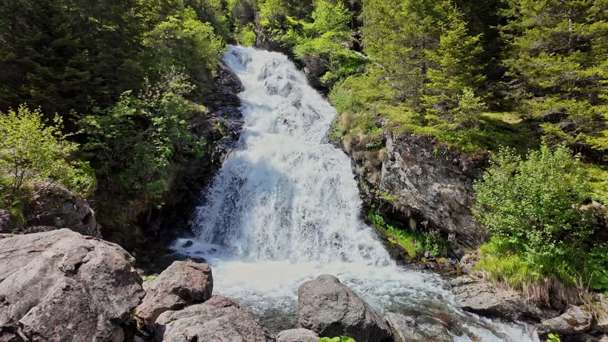 Nature wildness. Rapid waterfall travel destination. Picturesque waterfall. Travel destination. Scenery waterfall route. Nature mountain landscape. Waterfall landscape. Roaring cascade