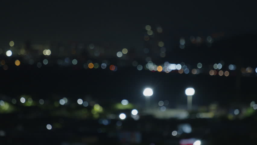 City of Praia Grande filled with transport at nigh. Brazil