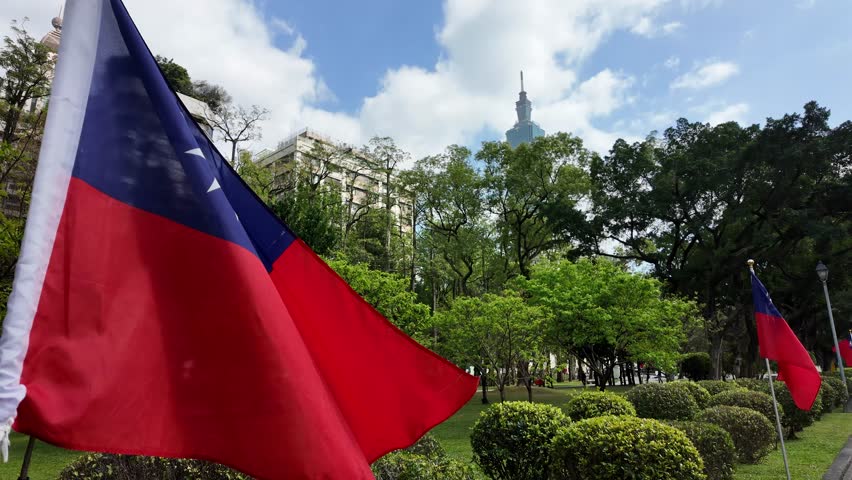 Taiwan National Flag with Taipei 101 tower and City Park