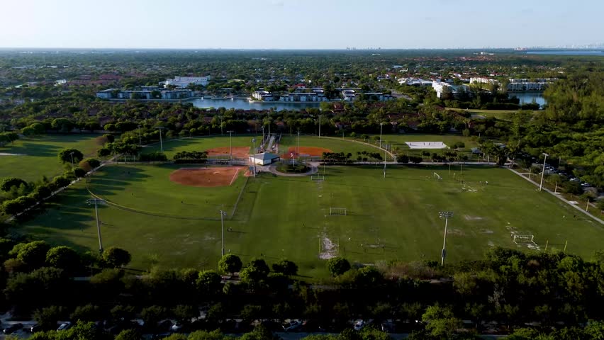 An Aerial view of a large sports complex in suburban Florida with green surroundings