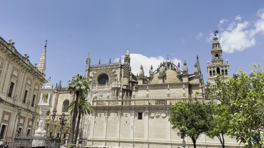 Majestic exterior view of the historic Seville Cathedral, a famous tourist destination in Andalusia