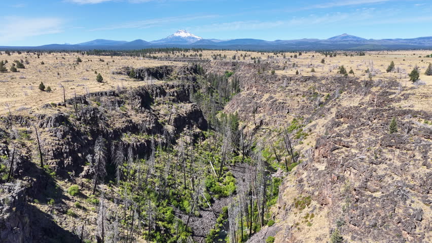 Over millennia Mill Creek has carved a 230-foot deep canyon on the Central Oregon plateau between Bend and Portland. This rugged yet scenic area of high desert is part of the Warm Springs reservation.