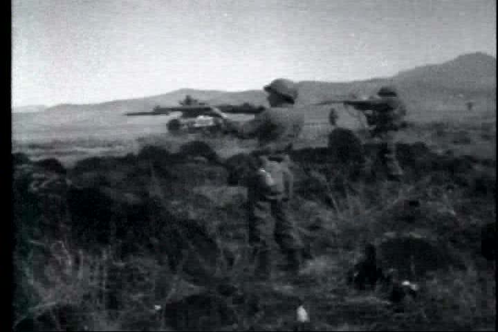 1950s - A film about the Korean War - footage of a tank convoy