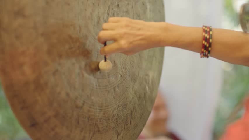Close-Up of a Gong Played with a Friction Mallet in Goa, India
