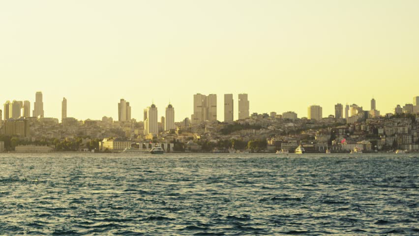 Istanbul City Skyline Over the Bosphorus at Sunset with Urban Buildings and Sea