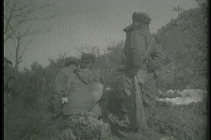1950s - A film about the Korean War - footage of American Troops engaged in combat with Chinese forces