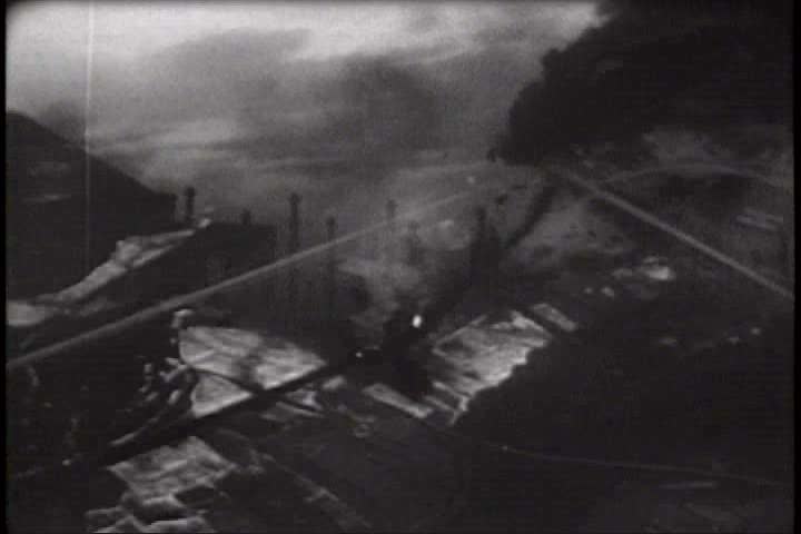 1950s - A film about the Korean War - footage of military vehicles leaving Inchon, Korea