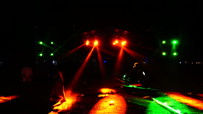 Colorful Stage Lights Beam Orange And Green At Night
