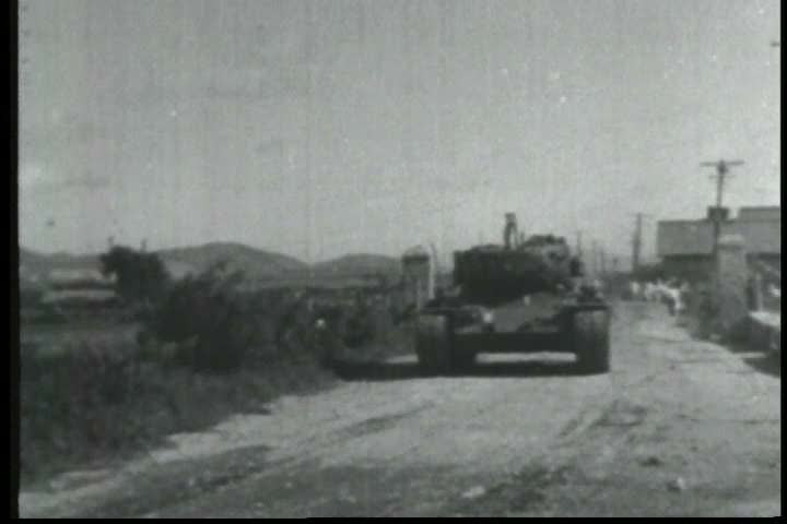 1950s - A film about the Korean War - footage of military vehicles and weapons, as well as footage of General Macarthur