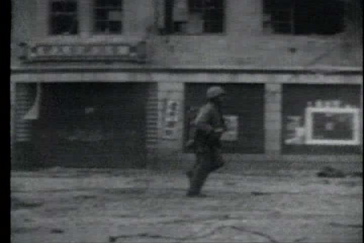 1950s - A film about the Korean War - footage of a street battle in Seoul, South Korea and airplanes taking off