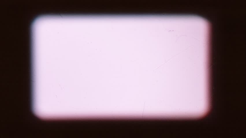 Vintage film frame overlay featuring a soft rounded matte, dark vignette borders, and subtle retro dust and scratches. This analog projector screen effect is perfect for adding a nostalgic aesthetic to your video editing projects. Ideal for blending in historical documentaries, flashback sequences, nostalgic marketing campaigns, music videos, and retro social media content. Use this 8mm style matte over your footage to create an authentic and classic cinematic look.