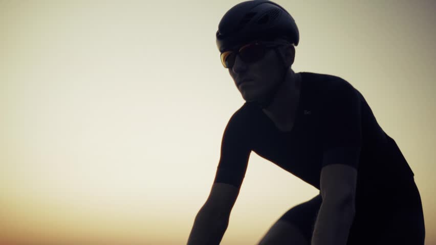 Triathlete Cyclist Sport Training  Bicycle Workout. Fit Athlete Cyclist Sport Workout Training Cycling Triathlon Competition. Cyclist Fitness Exercising Cardio Cycling. Cyclist Road Bike Triathlon Race