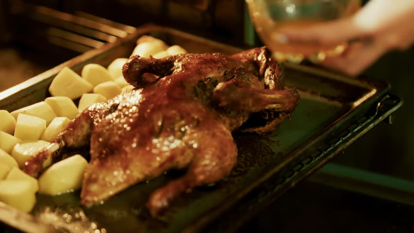 Holiday Dinner Cooking Roasted Goose Family Celebration. Baked Duck With Honey Home Cooking. Homemade Grilled Goose Meat. Cooking Whole Duck In Oven. Crispy Crust Roasted Duck For Holiday Celebration