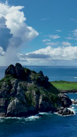 Seaside scenic vulcan mountain and beach at archipelago of Fernando de Noronha Brazil. Tropical islands at Fernando de Noronha archipelago. Vacation travel. Tropical destination.