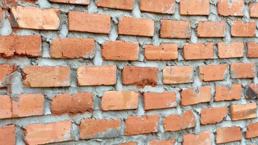 Textured Red Brick Wall Close Up for Construction Background