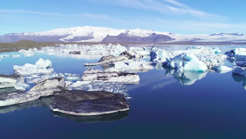 Glacial lagoon landscape with icebergs and arctic scenery.