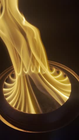 Close-up of a bright tabletop fire pit flame creating a warm outdoor atmosphere for summer evenings.