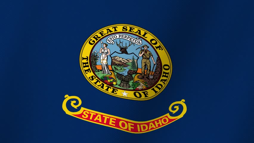 The Great Seal of the State of Idaho on its official flag with detailed emblem and banner
