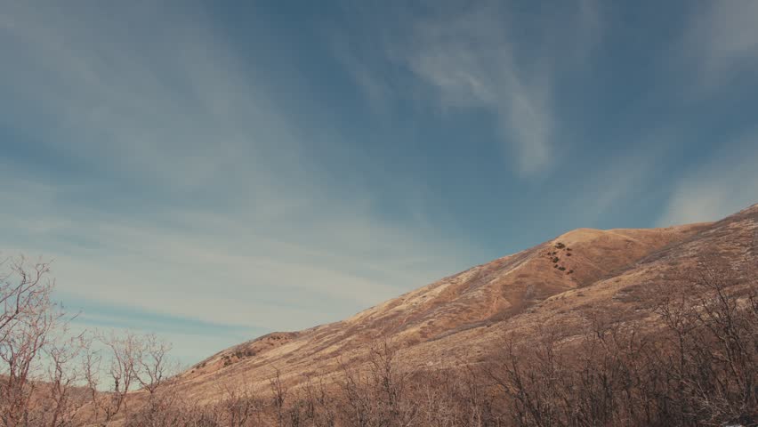 Scenic mountain landscape with passing clouds