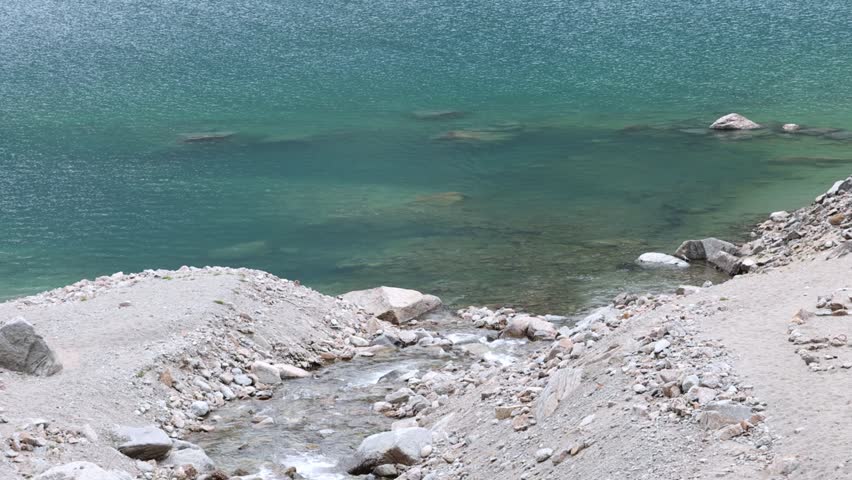 Mountain Stream Flowing into Ceresole Reale Lake in Gran Paradiso National Park, Italy