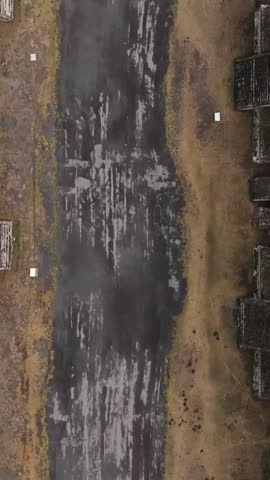 Top down aerial of the Avenue of the Dead revealing the Pyramid of the Moon at Teotihuacan, Mexico.