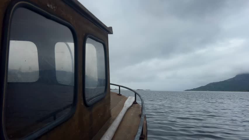 Ocean travel captured from the deck of a old wooden boat.