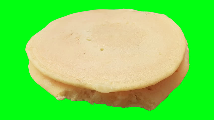 Pancakes on a green screen background.