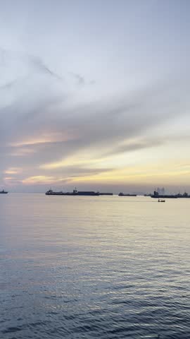 Sunrise at Muara Baru Port, North Jakarta.