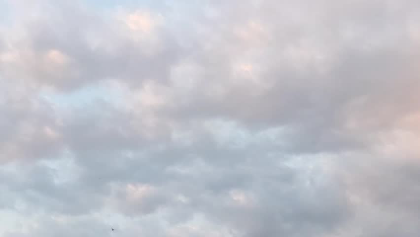 shows the sky with varying cloud cover in the afternoon