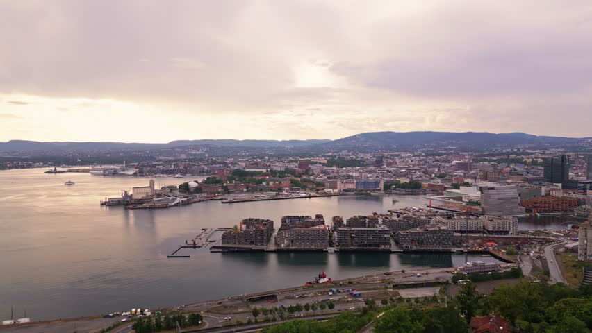 Aerial view of Sorengautstikkeren featuring modern residential architecture along the Oslofjord waterfront at sunset in Oslo, Oslo, Norway.