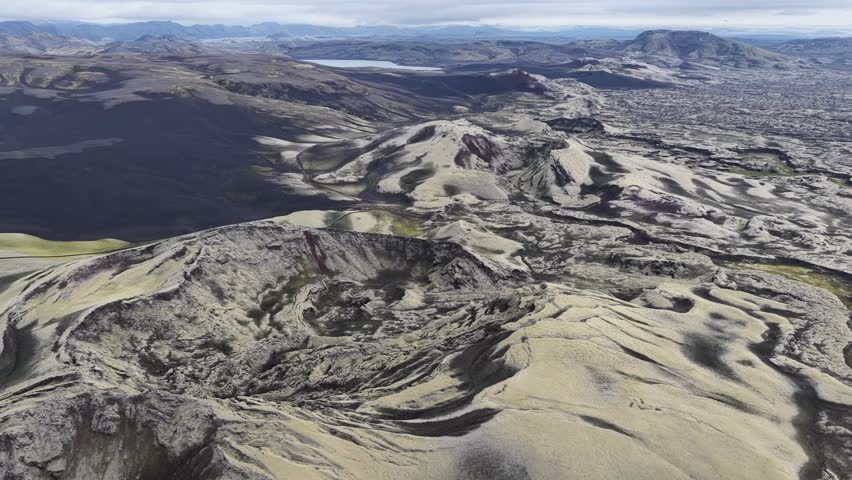 Aerial view of Laki volcanic craters, featuring rugged lava fields, moss-covered terrain, and volcanic fissures in Skaftarhreppur, Iceland.