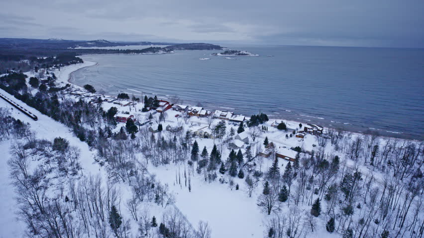 Aerial view of snow-covered Marquette, Michigan in winter.