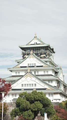 Osaka Castle Surrounded by Moat and Autumn Foliage