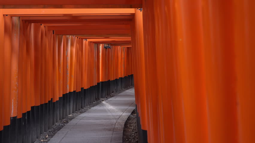 The iconic torii gates at Fushimi Inari Shrine in Kyoto, Japan.