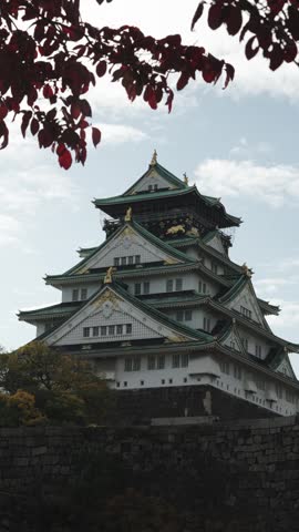 Osaka Castle Surrounded by Moat and Autumn Foliage