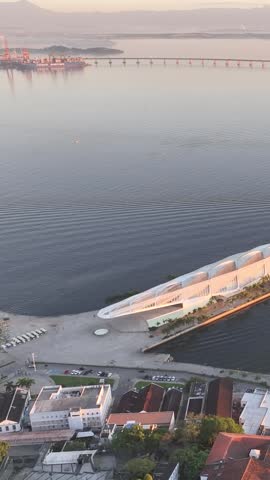 Rio de Janeiro in sunrise, Brazil. City center. Aerial view, establishing shot. Rio Niteroi Bridge.