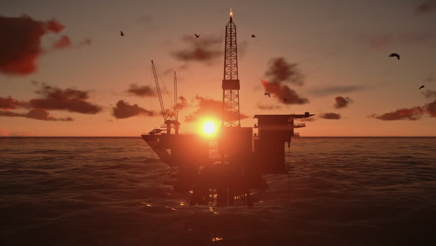 Oil Rig in ocean, beautiful time lapse sunset
