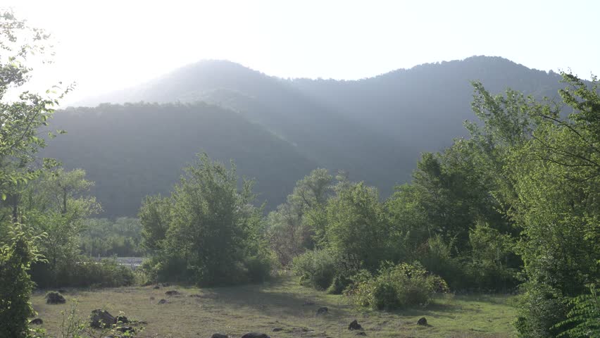 Scenic view of a majestic valley landscape featuring rolling hills, lush greenery, and breathtaking natural scenery that captures the tranquility and grandeur of the great outdoors.