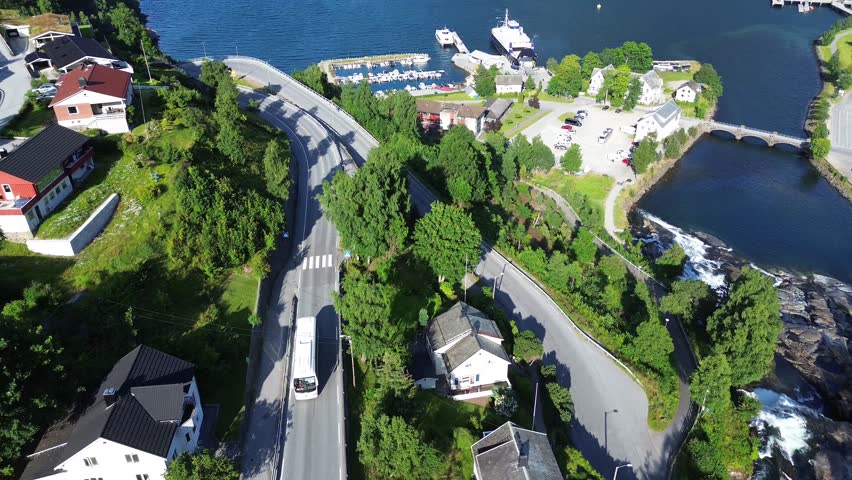  Drone Following Bus Through Hellesylt Village in Western Norway