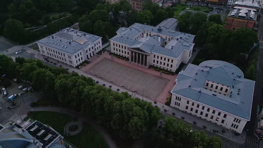 Aerial view of the Faculty of Law at the University of Oslo, featuring neoclassical architecture, a central courtyard, and surrounding green spaces in Oslo, Oslo, Norway.