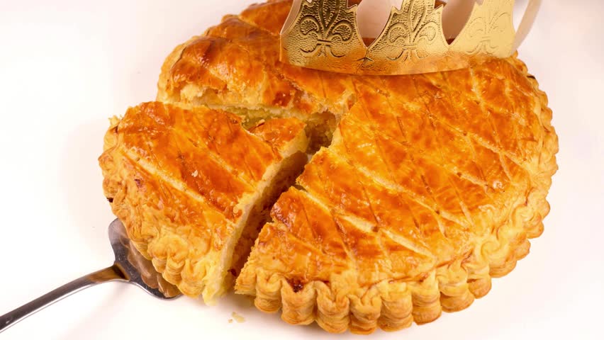 Golden Baked Pastry Tart With Caramelized Topping On White Plate